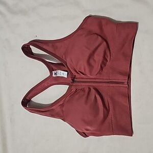 Sized large front zip sports bra